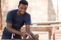 male youth working with his hands
